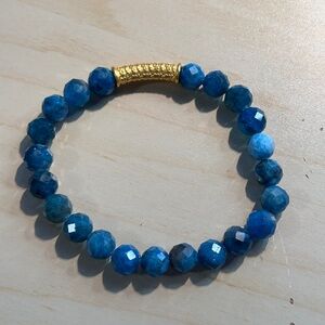 Blue Apatite (8mm) with 24k gold baifu (Feng Shui in HK).